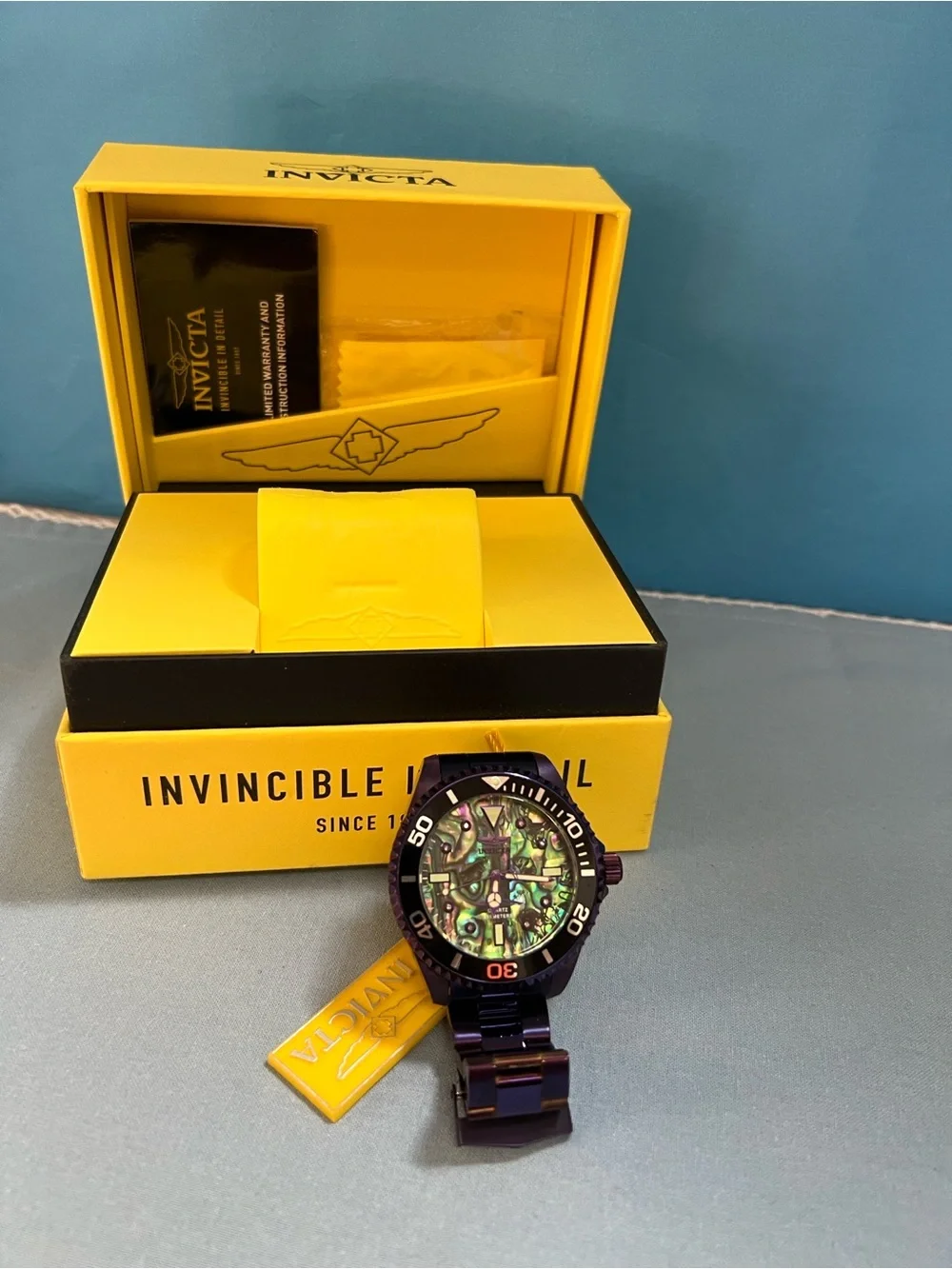 Invicta Men's Watch with Iridescent Green Abalone Face & Dark Purple Steel Band